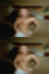 Naked woman lactating